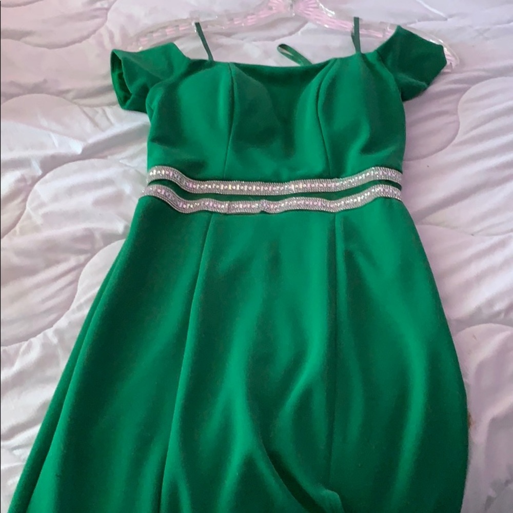I am selling a green dress.